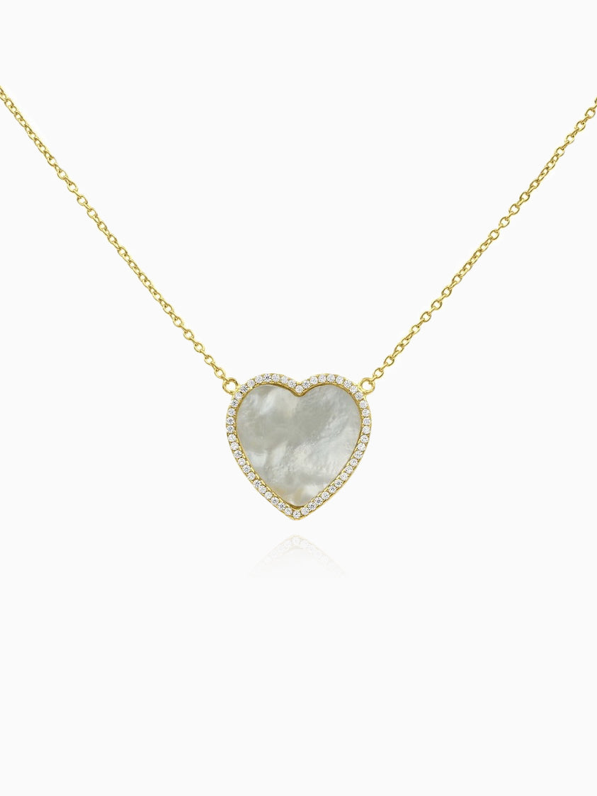 This delicate heart-shaped necklace is crafted from 14K gold-plated 925 sterling silver and adorned with 5A cubic zirconia and white mother of pearl for a touch of elegance. The adjustable chain measures 16?â‚?18 inches (44 cm), allowing for versatile styling, and is secured with a lobster lock clasp. The heart pendant measures 0.73 inches (1.85 cm), making this Joy & Rachel necklace a timeless and charming accessory.